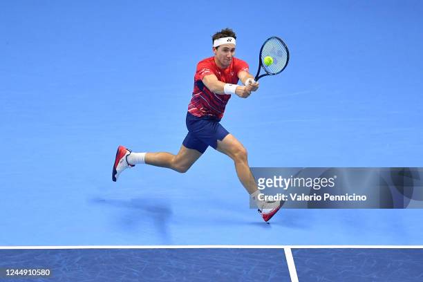 Casper Ruud of Norway plays a backhand shot during the semi final match between Andrey Rublev of Russia during day seven of the Nitto ATP Finals at...