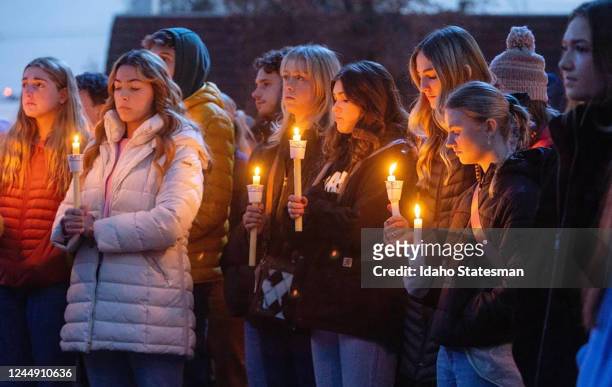 Boise State University students and people who knew the University of Idaho students who were killed in Moscow, Idaho, pay tribute at a vigil on Nov....