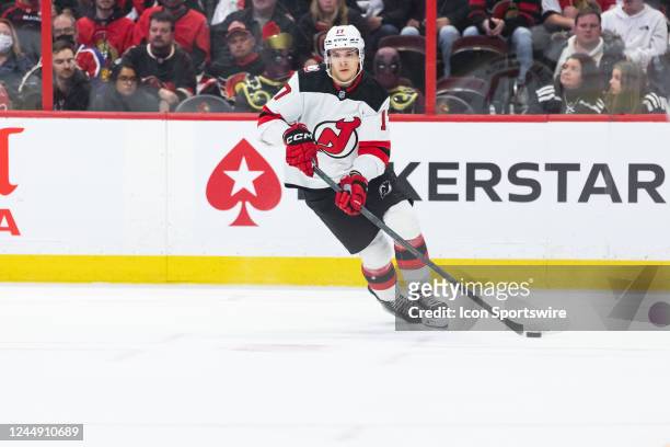 New Jersey Devils Center Yegor Sharangovich skates with the puck during third period National Hockey League action between the New Jersey Devils and...