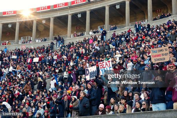 Fans watch the Harvard Crimson and the Yale Bulldogs the Harvard Crimson and the Yale Bulldogs play for the 138th time during the second half at...