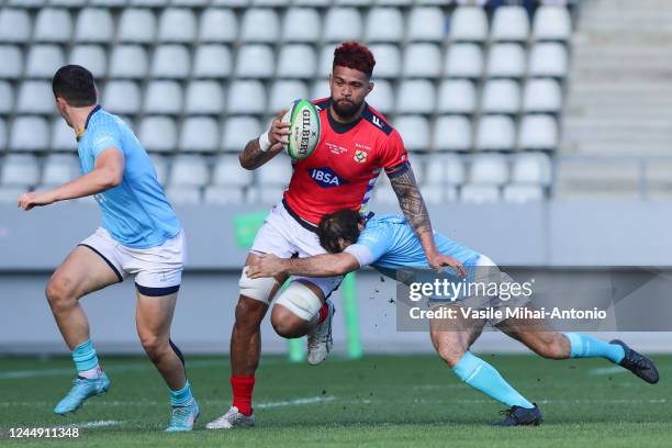 Vaea Fifita of Tonga competes for the ball with Lucas Bianchi of Uruguay during the Autumn International match between Tonga and Uruguay at Arc de...