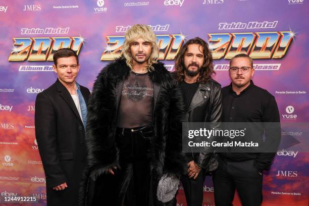 Georg Listing, Bill Kaulitz, Tom Kaulitz and Gustav Schäfer attend the Tokio Hotel album release party at JMES Club on November 19, 2022 in Berlin,...