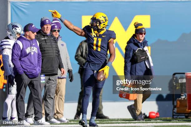 West Virginia Mountaineers wide receiver Cortez Braham signals for a first down after making a catch during the first quarter of the college football...