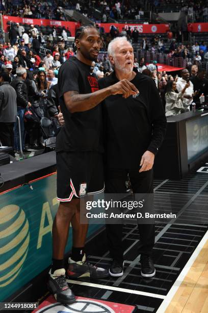 Kawhi Leonard of the LA Clippers and Head Coach Gregg Popovich of the San Antonio Spurs talk after the game on November 19, 2022 at Crypto.Com Arena...