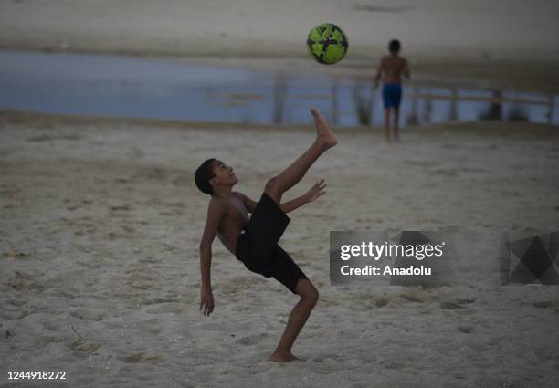 Children from the favela of Mare, in the northern part of the city, play soccer as they find soccer and sport a refuge for fun and education, to stay...