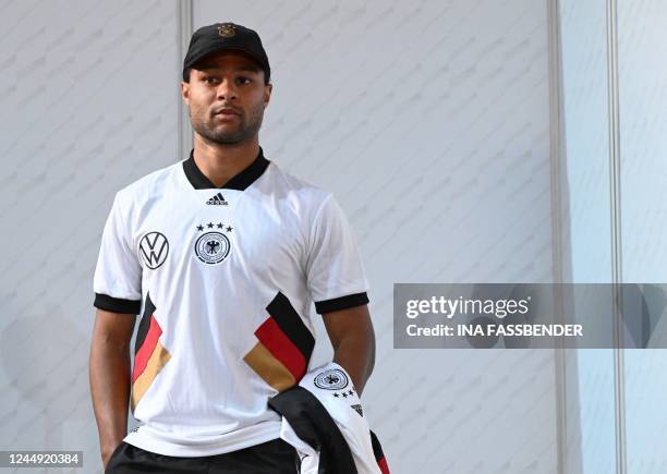 Germanys forward Serge Gnabry arrives to attend a press conference at Al Shamal Stadium in Al Shamal, north of Doha, on November 20 ahead of the...