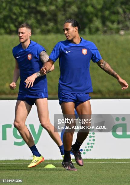 Netherlands' defender Virgil van Dijk takes part in a training session at Qatar University in Doha on November 20 on the eve of the Qatar 2022 World...
