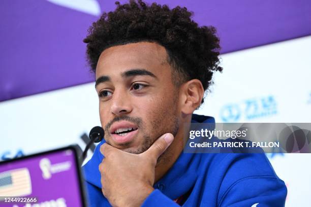 S midfielder Tyler Adams attends a press conference at the Qatar National Convention Center in Doha on November 20 on the eve of the Qatar 2022 World...