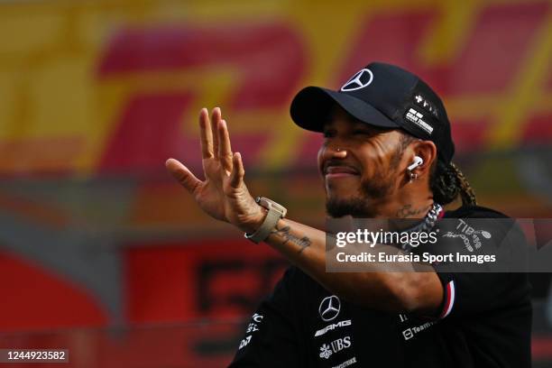 Lewis Hamilton of Great Britain Mercedes AMG Petronas F1 Team W13 walks around the grid during the F1 Grand Prix of Abu Dhabi at Yas Marina Circuit...