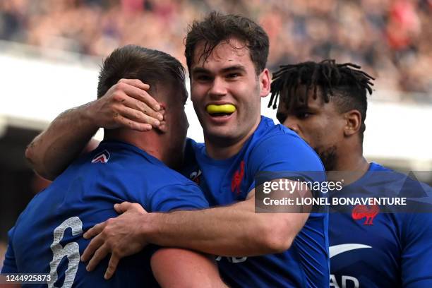 France's flanker Anthony Jelonch celebrates with France's wing Damian Penaud after scoring a try during the autumn international rugby union test...