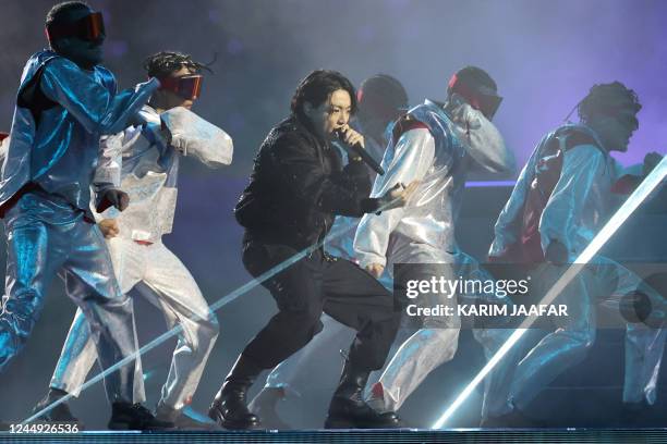 South Korean singer Jung Kook performs during the opening ceremony ahead of the Qatar 2022 World Cup Group A football match between Qatar and Ecuador...