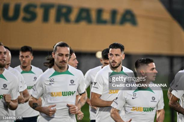 Australia's forward Mathew Leckie and teammates attend a training session at the Aspire Academy in Doha on November 20 ahead of the Qatar 2022 World...