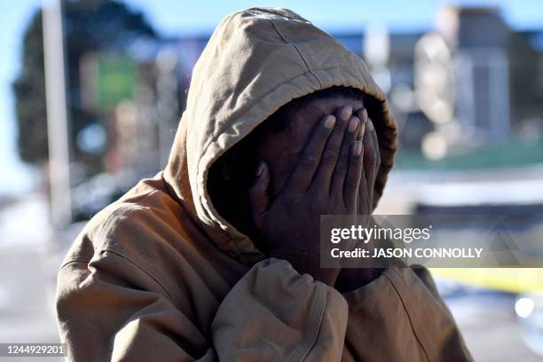 Joshua Thurman, of Colorado Springs, reacts the morning after a mass shooting at Club Q, an LGBTQ nightclub in Colorado Springs, Colorado, on...