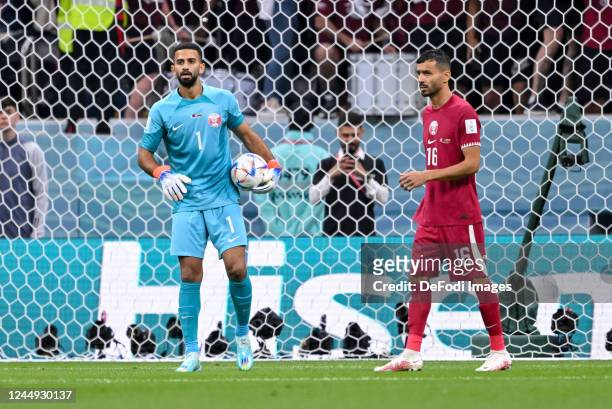 Goalkeeper Saad Alhheeb of Qatar and Boualem Khoukhi of Qatar looks dejected during the FIFA World Cup Qatar 2022 Group A match between Qatar and...