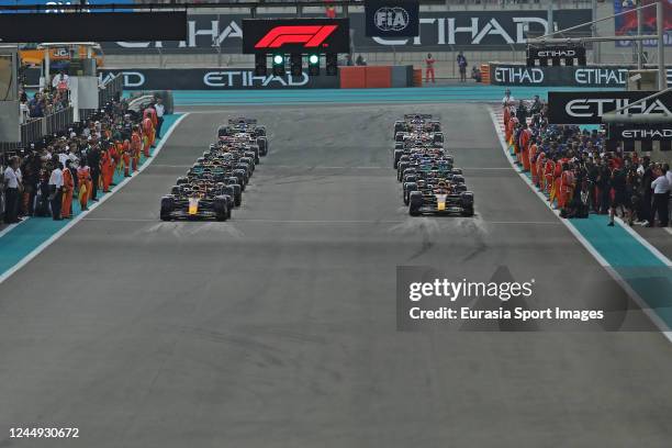 Team cars at start grid during the F1 Grand Prix of Abu Dhabi at Yas Marina Circuit on November 20, 2022 in Abu Dhabi, United Arab Emirates.