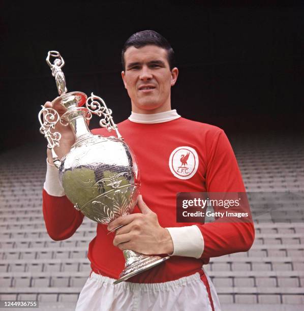 Ron Yeats of Liverpool with the 1965/66 League Division One trophy at Anfield, Liverpool, circa 1966.