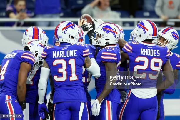 Buffalo Bills safety Dean Marlowe and Buffalo Bills cornerback Xavier Rhodes gather with teammates before an NFL football game between the Buffalo...