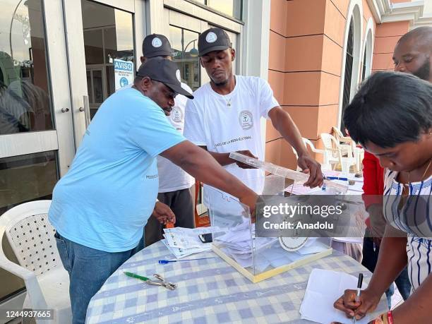 Electoral officials count votes as the voting ends for presidential, legislative elections in Malabo, Equatorial Guinea on November 20, 2022.