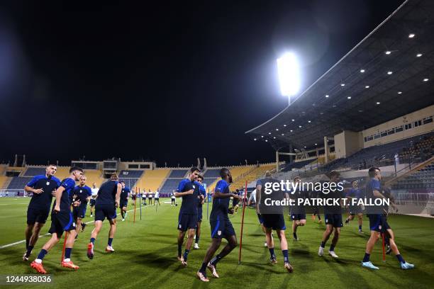 S players take part in training session at Al Gharafa SC Stadium in Doha on November 20 on the eve of the Qatar 2022 World Cup football tournament...