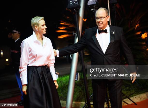 Princess Charlene of Monaco and Prince Albert II of Monaco arrive on the red carpet before the 2022 World Rugby Awards ceremony in Monaco on November...