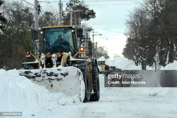 November 20: A national Guard loader clears heavy snow from Lake Shore Road after an intense lake-effect snowstorm that impacted the area on November...