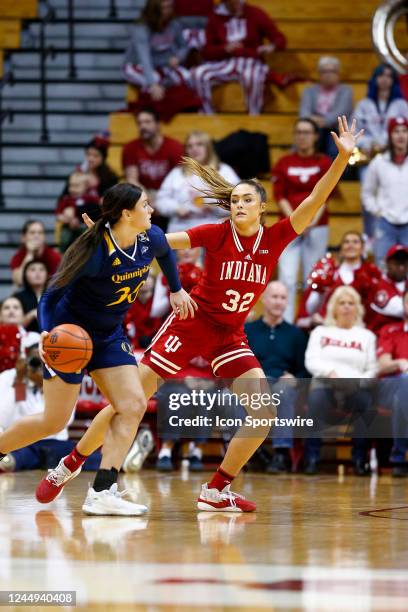 Indiana Hoosiers forward Alyssa Geary plays defense as Quinnipiac Bobcats forward Mikala Morris looks to drive round her during a womens college...