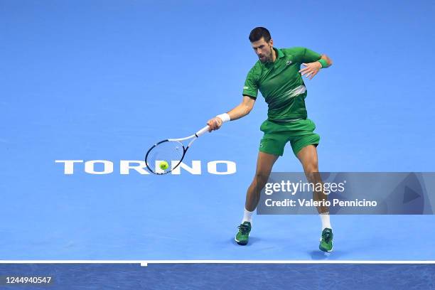 Novak Djokovic of Serbia plays a forehand shot during the final match between Casper Ruud of Norway during day eight of the Nitto ATP Finals at Pala...