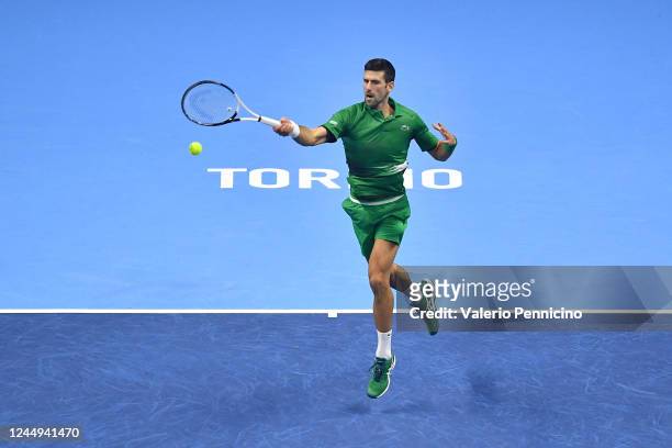 Novak Djokovic of Serbia plays a forehand shot during the final match between Casper Ruud of Norway during day eight of the Nitto ATP Finals at Pala...