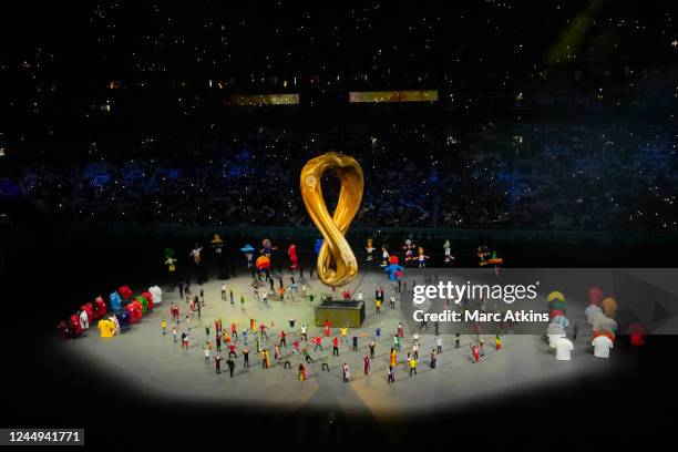 Performers perform with mascots from previous world cup tournaments during the opening ceremony prior to the FIFA World Cup Qatar 2022 Group A match...