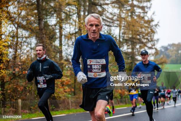 An old man is seen running the race. About 17,500 participants ran the 'NN Zevenheuvelenloop' which has attracted thousands of runners from The...