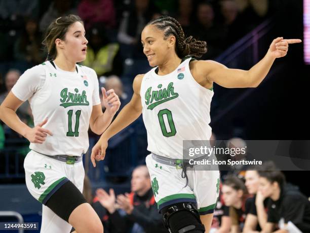 Notre Dame Fighting Irish guard Jenna Brown reacts after a play during a women's college basketball game between the Ball State Cardinals and the...