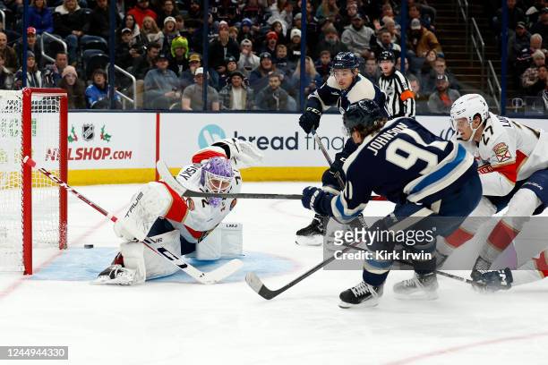Kent Johnson of the Columbus Blue Jackets shoots a shot past Sergei Bobrovsky of the Florida Panthers and wide of the net during the second period of...