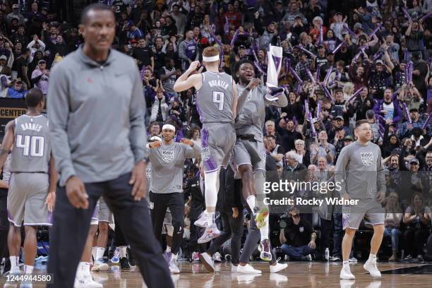 Kevin Huerter and Chimezie Metu of the Sacramento Kings react to a play during the game against the Detroit Pistons on November 20, 2022 at Golden 1...