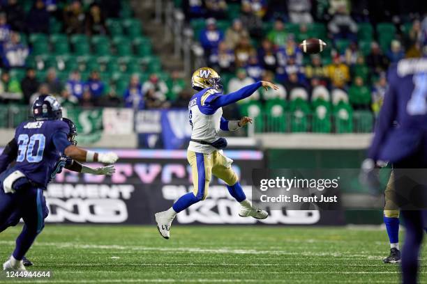 Zach Collaros of the Winnipeg Blue Bombers throws on the run in the first half of the 109th Grey Cup game between the Toronto Argonauts and Winnipeg...