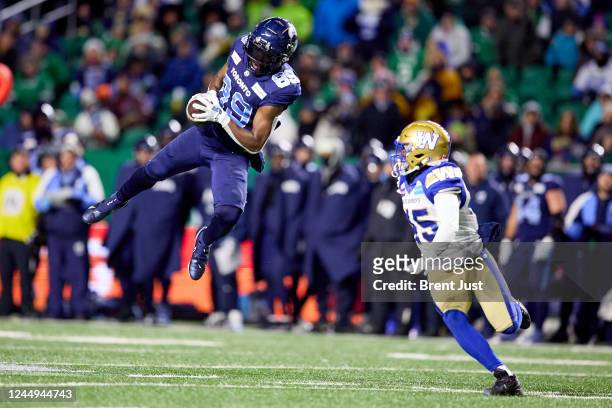 Cam Phillips of the Toronto Argonauts makes a leaping catch in the first half of the 109th Grey Cup game between the Toronto Argonauts and Winnipeg...