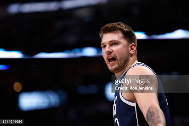 Luka Doncic of the Dallas Mavericks questions a game official as the Mavericks take on the Denver Nuggets in the first half at American Airlines...