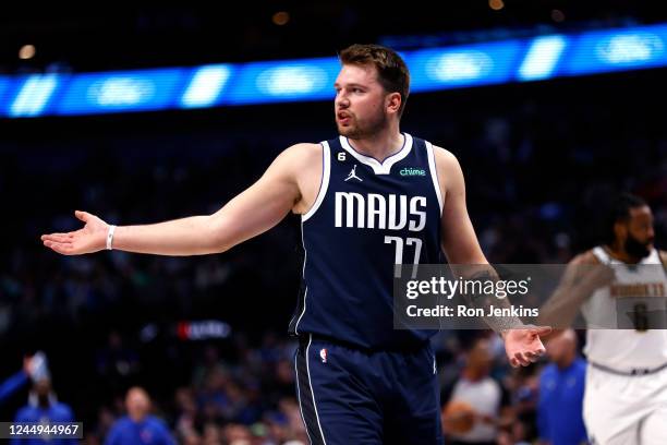 Luka Doncic of the Dallas Mavericks questions a game official as the Mavericks take on the Denver Nuggets in the first half at American Airlines...