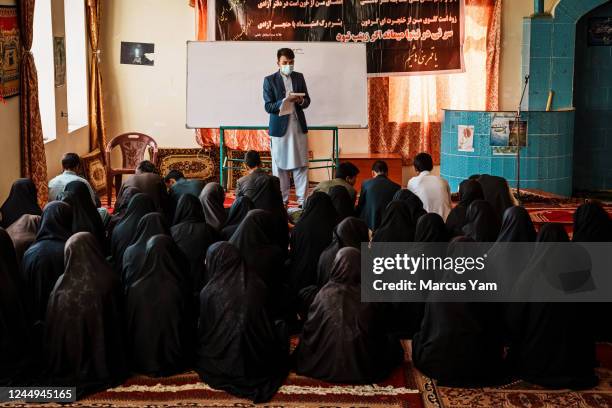 Afghan girls attend a religious school, the only permitted form of education for girls between the ages of 6th and 12th grade, at Hawza Elmya Mahdia...