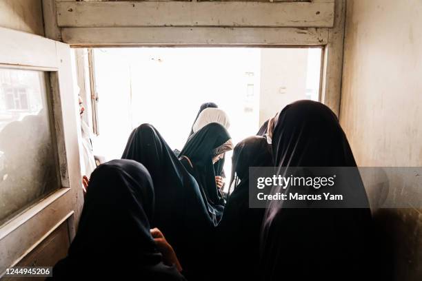 Afghan girls attend a religious school, the only permitted form of education for girls between the ages of 6th and 12th grade, at Hawza Elmya Mahdia...