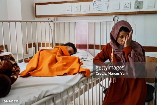 Mothers and their infants recover after being admitted into the childrenÕs malnourishment ward, at the Bamyan Provincial Hospital in Bamyan,...