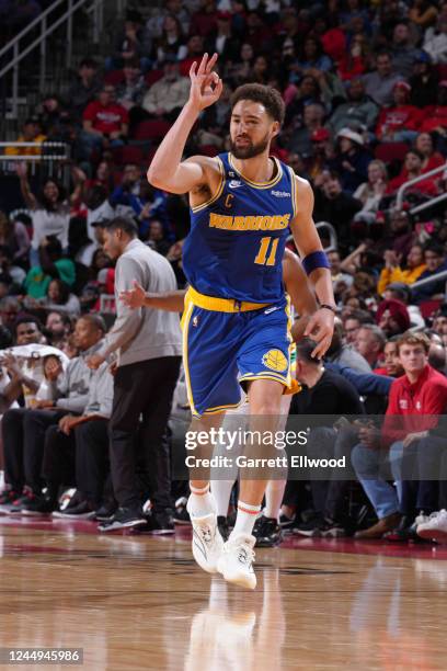 Klay Thompson of the Golden State Warriors celebrates a three point basket during the game against the Houston Rockets on November 20, 2022 at the...