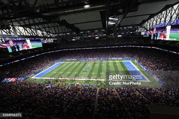 The National Anthem is sung in front of a sold out stadium prior to the first half of an NFL football game relocated to Ford Field between the...