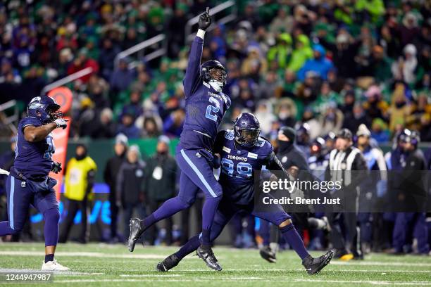 Shawn Oakman and Dewayne Hendrix of the Toronto Argonauts celebrate after a sack in the 109th Grey Cup game between the Toronto Argonauts and...