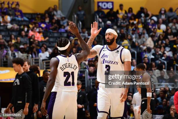 Patrick Beverley and Anthony Davis of the Los Angeles Lakers high five during the game against the San Antonio Spurs on November 20, 2022 at...