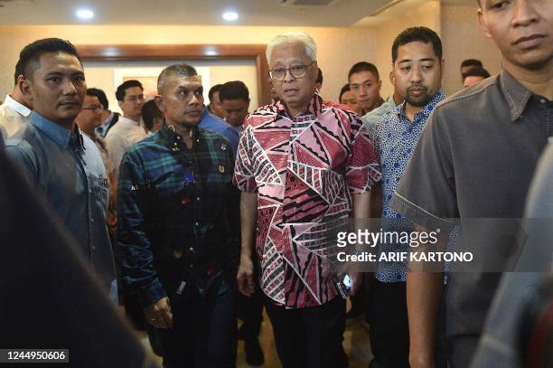 Malaysia's outgoing Prime Minister Ismail Sabri Yakoob leaves after a press conference in Kuala Lumpur, on November 21, 2022. - In a bid to break the...