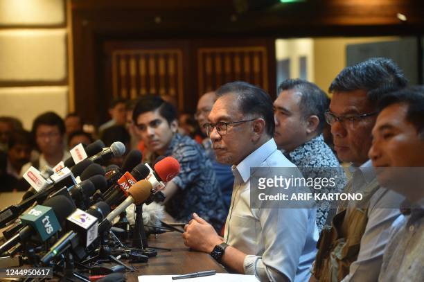 Malaysias opposition leader and chairman of Pakatan Harapan Anwar Ibrahim gives a press conference in Kuala Lumpur, Malaysia on November 21, 2022. -...