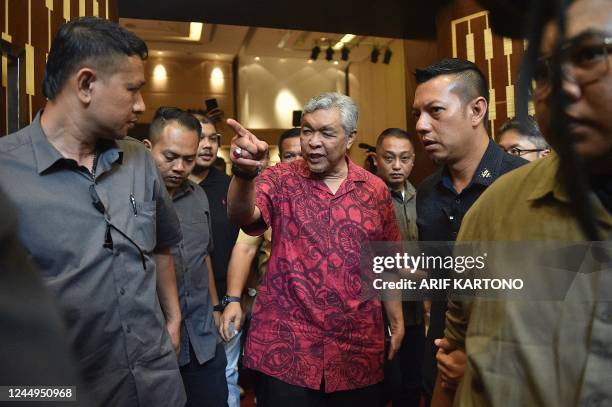 United Malays National Organization President Ahmad Zahid Hamidi leaves after a press conference in Kuala Lumpur, on November 21, 2022. - In a bid to...