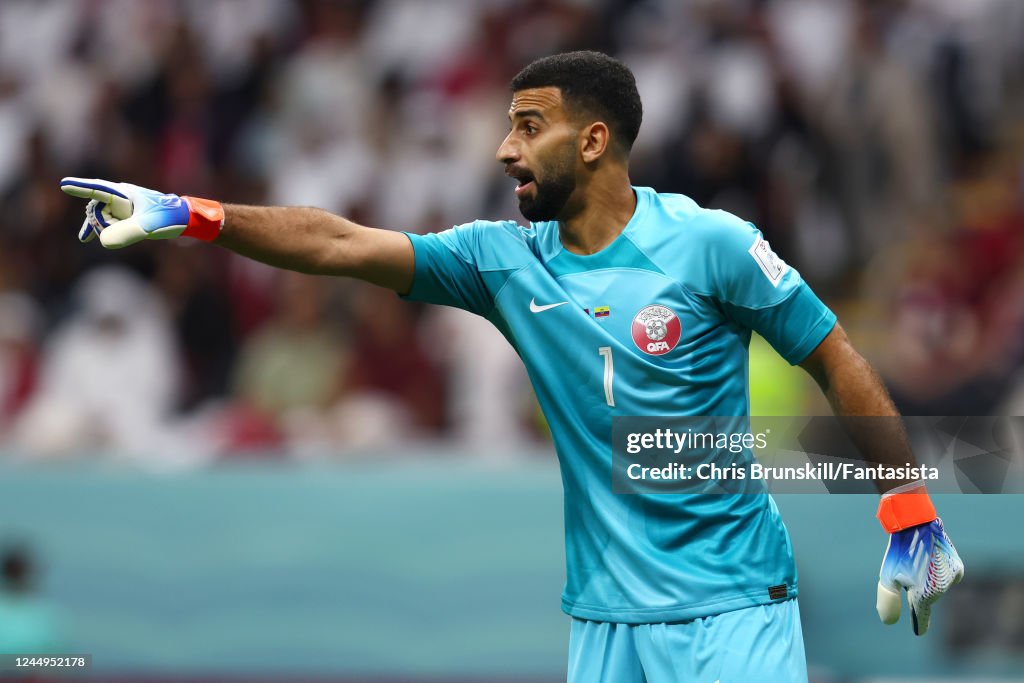 Saad Al-Sheeb of Qatar gestures during the FIFA World Cup Qatar 2022 ...