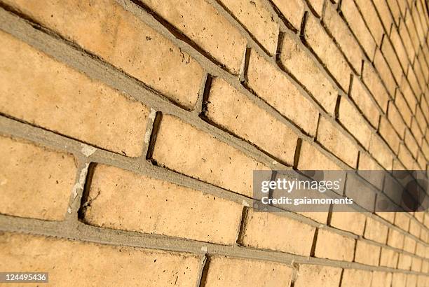 brick wall perspective - beige brick stock pictures, royalty-free photos & images