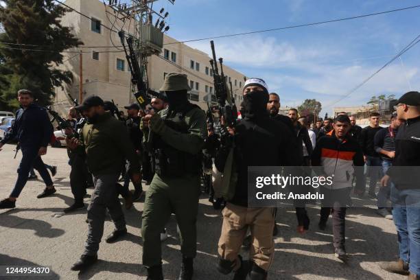 Relatives of 17-year-old Mahmoud al-Saadi who got shot and killed during the raid by Israeli forces, and Palestinian armed groups attend the funeral...